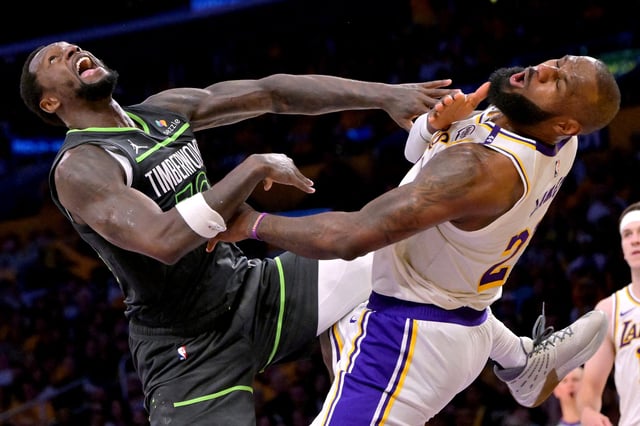 Apr 19, 2025; Los Angeles, California, USA; Los Angeles Lakers forward LeBron James (23) reacts after taking an elbow from Minnesota Timberwolves forward Julius Randle (30) in the second half at Crypto.com Arena. Mandatory Credit: Jayne Kamin-Oncea-Imagn Images/File Photo