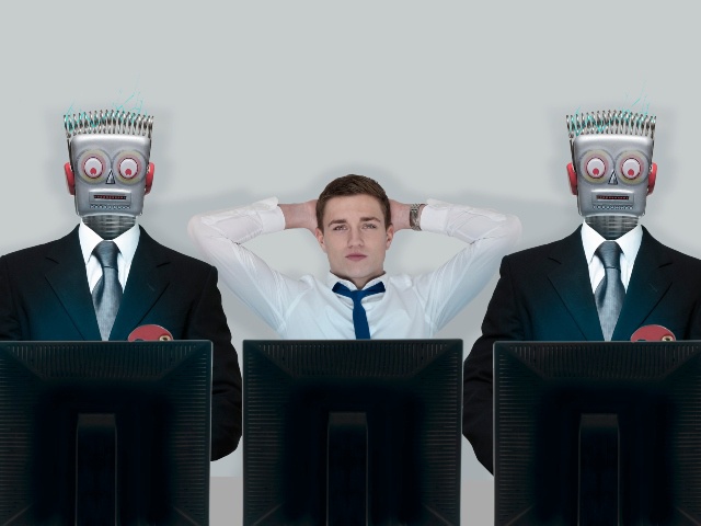 Human relaxes between robot workers in office