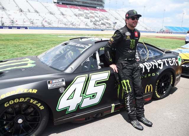 Jun 25, 2022; Nashville, Tennessee, USA; NASCAR Cup Series driver Kurt Busch (45) stands at his car during qualifying for the Ally 400 at Nashville Superspeedway. Mandatory Credit: Christopher Hanewinckel-USA TODAY Sports/File Photo