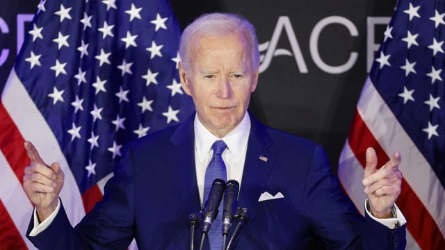 Social media users speculate Joe Biden's Easter family photo may be photoshopped, highlighting lighting inconsistencies and odd positioning. (Photo by tannen MAURY / AFP)