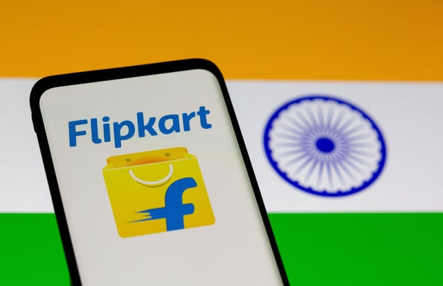 Smartphone with Flipkart logo is seen in front of displayed Indian flag in this illustration taken, July 30, 2021. REUTERS/Dado Ruvic/Illustration/File Photo