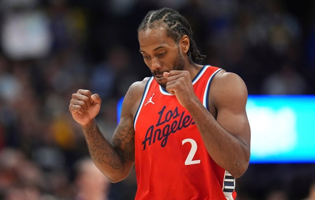Clippers star Kawhi Leonard celebrates as time runs out in Game 2 of their first-round playoff series against the Denver Nuggets on Monday night in Denver. Leonard had 39 points on 15-of-19 shooting to lead the Clippers to a 105-102 win that evened the best-of-seven series. (AP Photo/David Zalubowski)