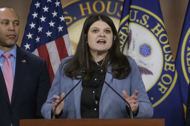 FILE - Rep. Haley Stevens, D-Mich., joined by House Minority Leader Hakeem Jeffries, D-N.Y., speaks during a press conference on Capitol Hill, Thursday, Feb. 6, 2025, in Washington. (AP Photo/Rod Lamkey, Jr., File)
