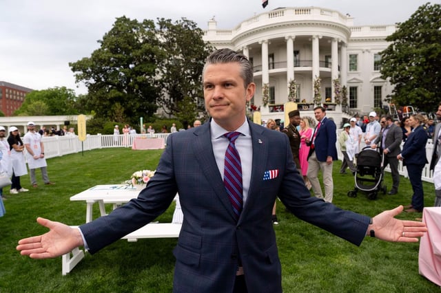 Defense Secretary Pete Hegseth speaks with reporters on the South Lawn of the White House on Monday. (AP Photo/Alex Brandon)