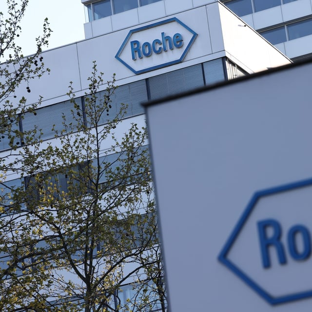 BASEL, SWITZERLAND - APRIL 11: A view of the sign and logo of the Roche Holding AG headquarters on April 11, 2025 in Basel, Switzerland. Before US President Donald Trump postponed a range of imminent tariffs, Switzerland was facing a daunting 31% levy on most Swiss goods to imported to the United States, a higher rate than would have been imposed on European Union countries. Such a tariff would've been high damaging to iconic Swiss industries like chocolate and watchmaking. The reprieve will provide breathing room for Swiss officials looking to negotiate a deal with the US, although Swiss goods will still face a 10% tariff in the meantime, and the fate of a potential separate tariff on pharmaceuticals is unknown. (Photo by Sedat Suna/Getty Images)