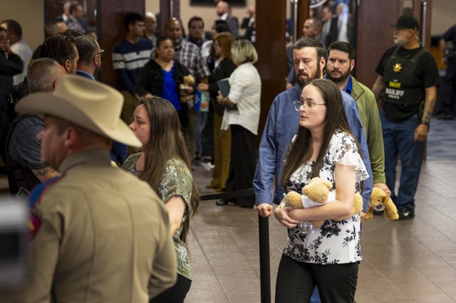 Families embrace as they leave the 409th District Court after Patrick Crusius pleaded guilty in the death of 23 people in the Aug. 3. 2019 Walmart Mass shooting, Monday, April 21, 2025, in El Paso, Texas. (AP Photo/Ivan Pierre Aguirre)