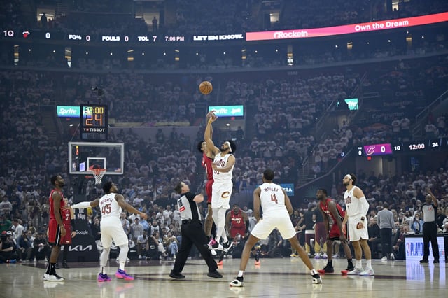 Apr 20, 2025; Cleveland, Ohio, USA; Cleveland Cavaliers center Jarrett Allen (31) jumps for the opening tip against the Miami Heat in the first quarter at Rocket Arena. Mandatory Credit: David Richard-Imagn Images/File Photo