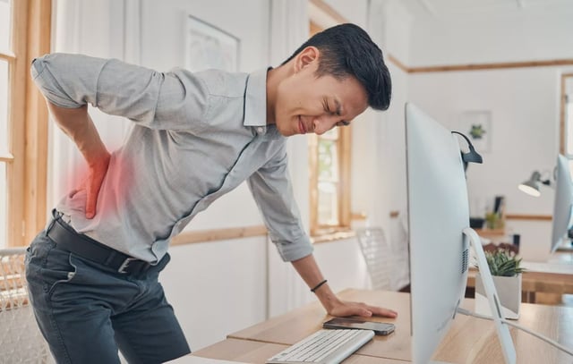 Businessman with back pain