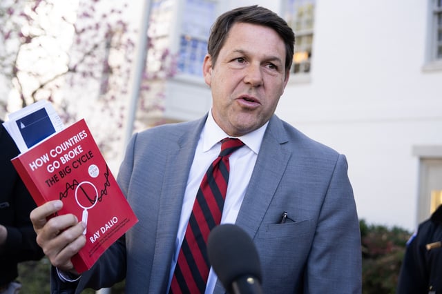 Rep. Jodey Arrington holds a copy of the Ray Dalio book How Countries Go Broke outside the Capitol Hill Club after a meeting of the House Republican Conference on Tuesday, March 25, 2025. (Tom Williams/CQ-Roll Call, Inc via Getty Images)