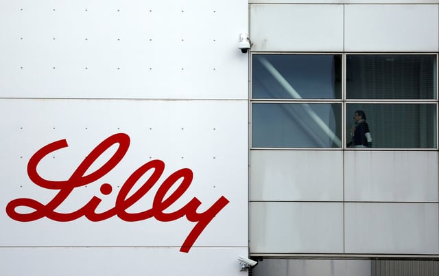 The logo of Lilly is seen on a wall of the Lilly France company unit, part of the Eli Lilly and Co drugmaker group, in Fegersheim near Strasbourg, France, February 1, 2018. Picture taken February 1, 2018. REUTERS/Vincent Kessler/File photo