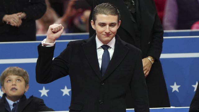Barron Trump's college life is complicated by security concerns, preventing typical interactions. He connects with peers through video games. (AP01_21_2025_000054B)