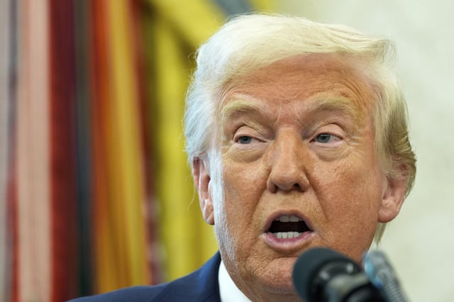President Donald Trump speaks with reporters as he participates in a ceremonial swearing in of Paul Atkins as chairman of the Securities and Exchange Commission, in the Oval Office of the White House, Tuesday, April 22, 2025, in Washington.