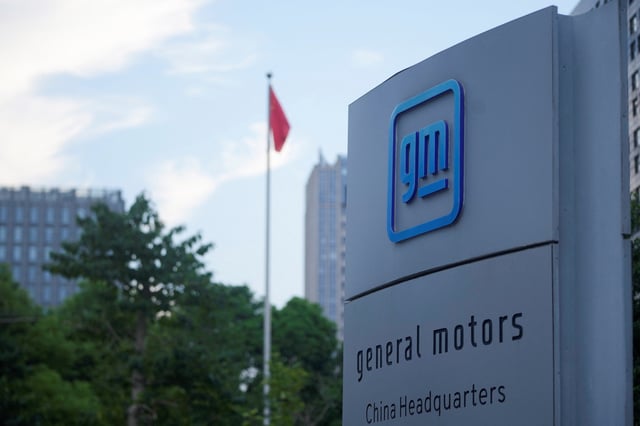 The GM logo is seen on the China Headquarters in Shanghai, China, August 29, 2022. REUTERS/Aly Song/ File Photo