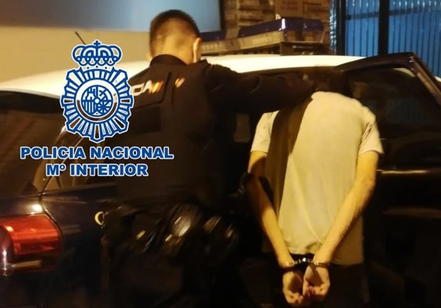 Detenido en foto de archivo