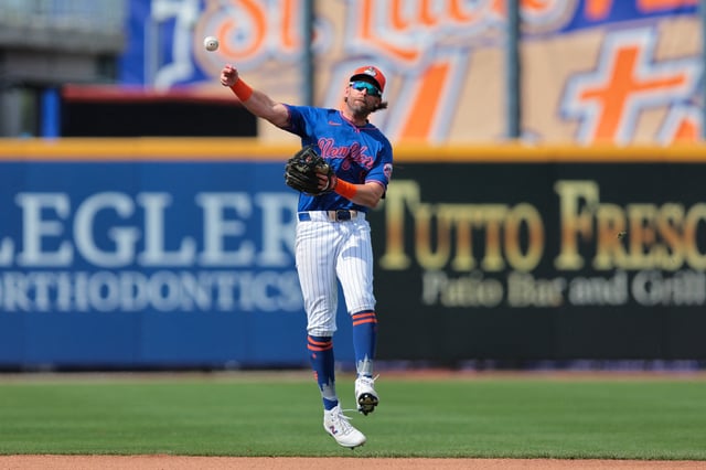 Feb 27, 2025; Port St. Lucie, Florida, USA; New York Mets second baseman Jeff McNeil (1) throws to first base but cannot retire Houston Astros first baseman Christian Walker (not pictured) during the fourth inning at Clover Park. Mandatory Credit: Sam Navarro-Imagn Images/File Photo