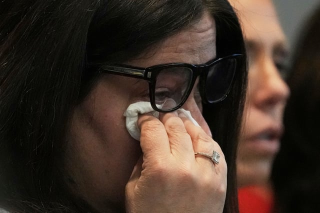 Victim of the Highland Park Independence Day parade shooting Elizabeth Turnipseed wipes her eyes during the sentencing hearing for Robert Crimo III, at the Lake County Courthouse, in Waukegan on April 23, 2025. (Nam Y. Huh/AP)