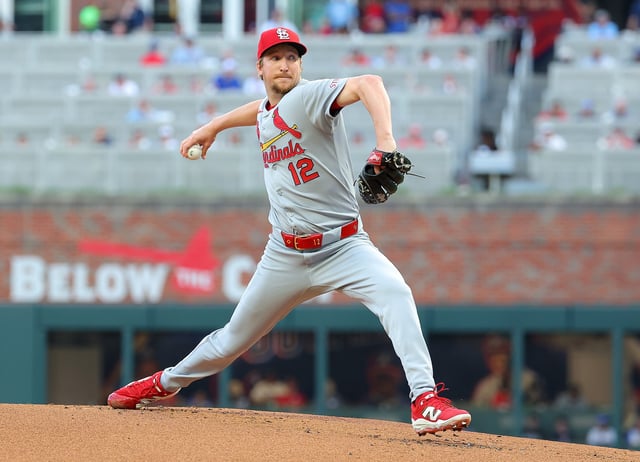 ATLANTA, GEORGIA - APRIL 21: Erick Fedde #12 of the St. Louis Cardinals pitches in the first inning against the Atlanta Braves at Truist Park on April 21, 2025 in Atlanta, Georgia.