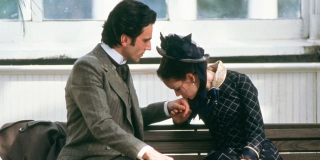 Winona Ryder's May kissing the hand of Daniel Day-Lewis' Newland in The Age of Innocence 
