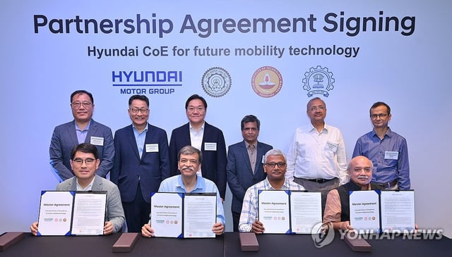This photo provided by Hyundai Motor Group shows representatives of the South Korean automotive group and the Indian Institute of Technology (IIT) Delhi at a partnership agreement signing ceremony held in Delhi on April 23, 2025. (PHOTO NOT FOR SALE) (Yonhap)
