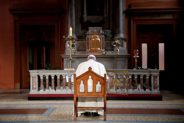 Pope Francis prays inside St. Mary's Pro Cathedral during his visit to Dublin in August 2018.
