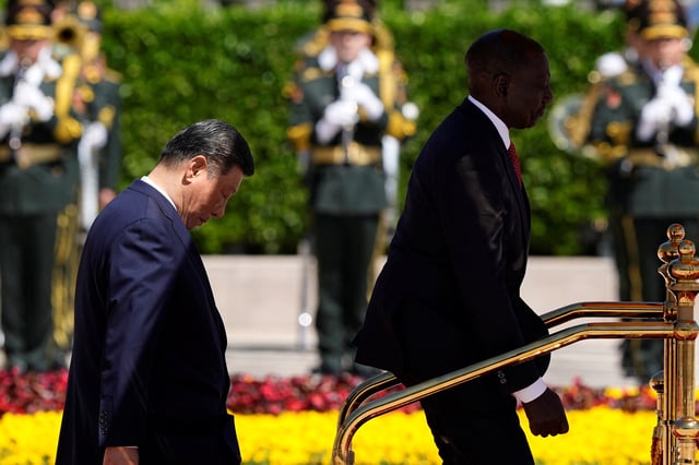 Chinese President Xi Jinping and Kenyan President William Ruto attend a welcome ceremony at The Great Hall of The People on April 24, 2025 in Beijing, China. IORI SAGISAWA/Pool via REUTERS