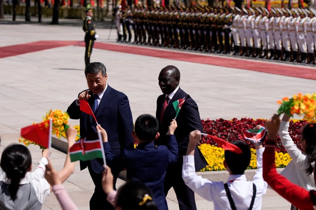 Chinese President Xi Jinping and Kenyan President William Ruto attend a welcome ceremony at The Great Hall of The People on April 24, 2025 in Beijing, China. IORI SAGISAWA/Pool via REUTERS