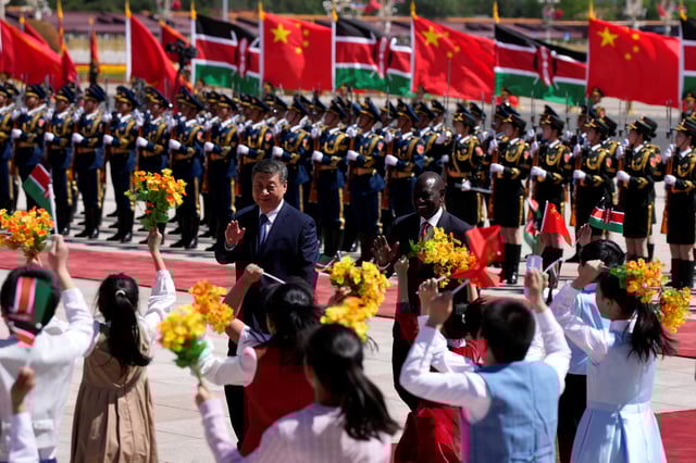 Chinese President Xi Jinping and Kenyan President William Ruto attend a welcome ceremony at The Great Hall of The People on April 24, 2025 in Beijing, China. IORI SAGISAWA/Pool via REUTERS