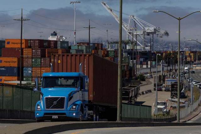 Shipping containers are seen at a terminal inside the Port of Oakland as truck drivers continue protesting against California's new law known as AB5, in Oakland, California, U.S., July 21, 2022. REUTERS/Carlos Barria/File Photo