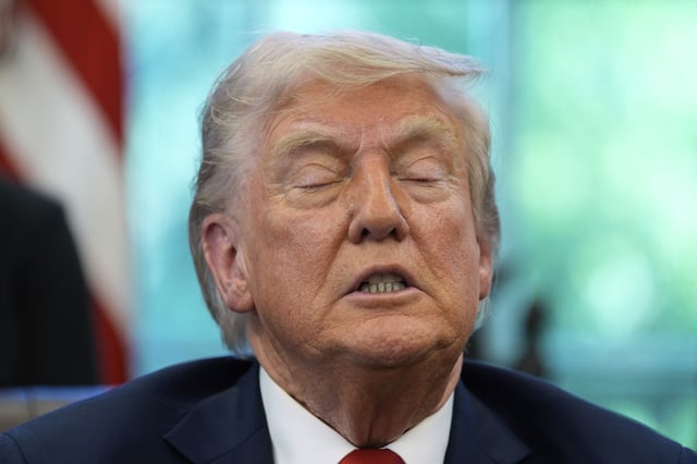 President Donald Trump speaks with reporters after signing executive orders in the Oval Office of the White House, Wednesday, April 23, 2025, in Washington. (AP Photo/Alex Brandon)