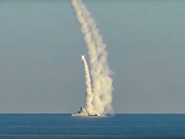 This handout photo taken from video released by Russian Defense Ministry Press Service in July 2024 shows long-range Kalibr cruise missiles launched by a Russian military ship from an unknown location.