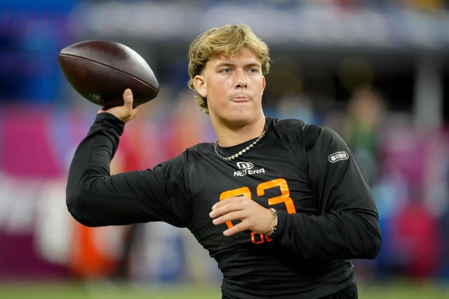 Mar 1, 2025; Indianapolis, IN, USA; Mississippi quarterback Jaxson Dart (QB03) during the 2025 NFL Combine at Lucas Oil Stadium. Mandatory Credit: Kirby Lee-Imagn Images/ File Photo