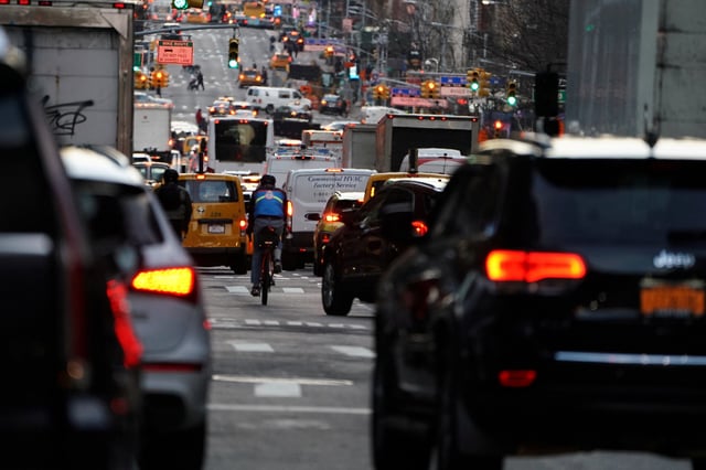 Traffic is pictured at twilight along 2nd Ave. in the Manhattan borough of New York, U.S., March 27, 2019. REUTERS/Carlo Allegri/File Photo