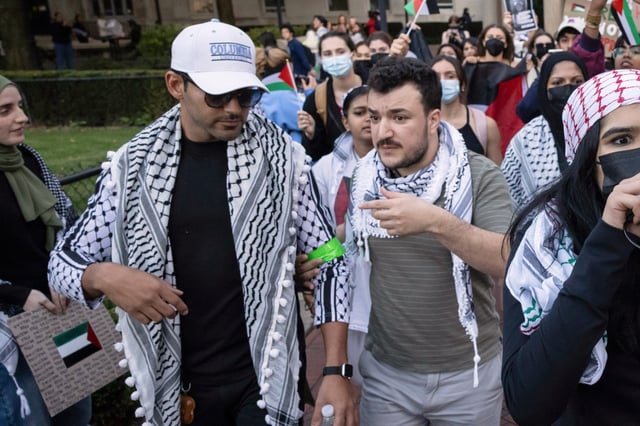 Mohsen Mahdawi, left, and Mahmoud Khalil participate in a pro-Palestinian protest at Columbia University, Thursday, Oct. 12, 2023, in New York.