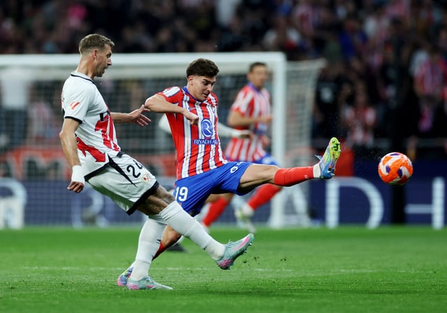 Soccer Football - LaLiga - Atletico Madrid v Rayo Vallecano - Metropolitano, Madrid, Spain - April 24, 2025 Rayo Vallecano's Florian Lejeune in action with Atletico Madrid's Julian Alvarez REUTERS/Isabel Infantes