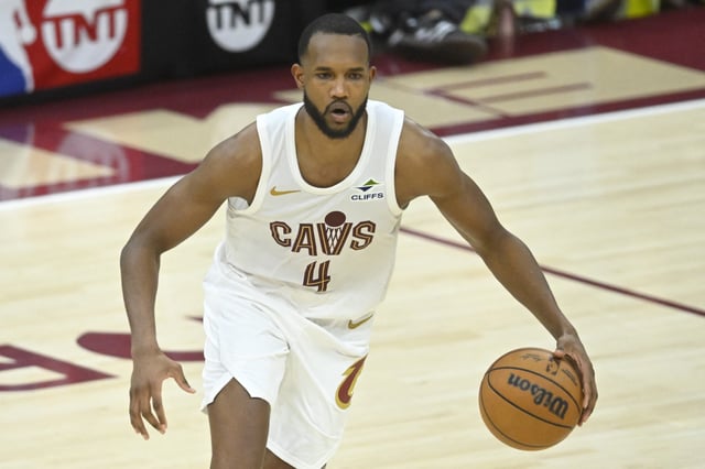 Apr 20, 2025; Cleveland, Ohio, USA; Cleveland Cavaliers forward Evan Mobley (4) dribbles the ball in the fourth quarter against the Miami Heat at Rocket Arena. Mandatory Credit: David Richard-Imagn Images/File Photo