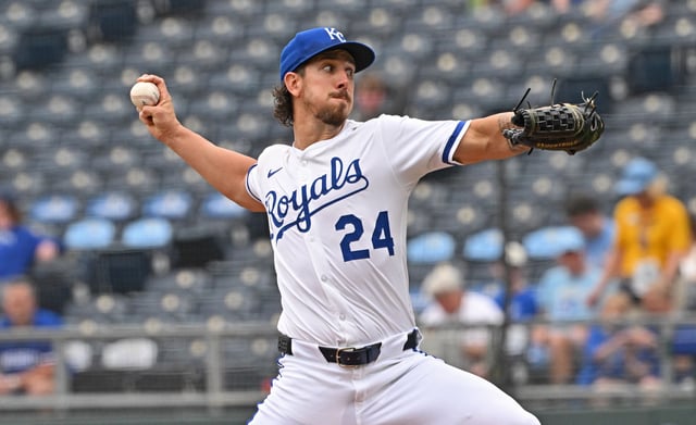 Apr 24, 2025; Kansas City, Missouri, USA;  Kansas City Royals starting pitcher Michael Lorenzen (24) throws a pitch in the first inning against the Colorado Rockies at Kauffman Stadium. Mandatory Credit: Peter Aiken-Imagn Images