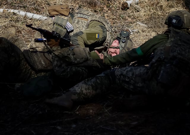 Young recruits of the 28th Knights of the Winter Campaign Separate Mechanised Brigade of the Ukrainian Armed Forces attend an exercise, amid Russia's attack on Ukraine, in Kyiv region, Ukraine April 4, 2025. Ukraine's Defence Ministry launched a recruitment drive for young people, 18- to 24-year-olds, to serve in the military for a year for the equivalent of about $24,000 and hefty bonuses. REUTERS/Gleb Garanich