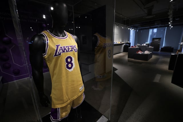 The first game-worn jersey of former Los Angeles Lakers NBA basketball star Kobe Bryant from the 1996-97 season is pictured during a press preview ahead Sotheby's sale of sports memorabilia in New York City, U.S., March 21, 2025. REUTERS/Mike Segar/File Photo