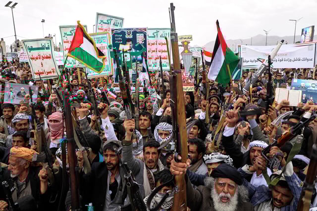 Houthi supporters chant slogans during a weekly, anti-US and anti-Israel rally in Sanaa, Yemen, on April 18.