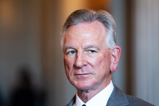 Sen. Tommy Tuberville speaks to reporters outside the Senate chamber at the Capitol, on July 13, 2023.