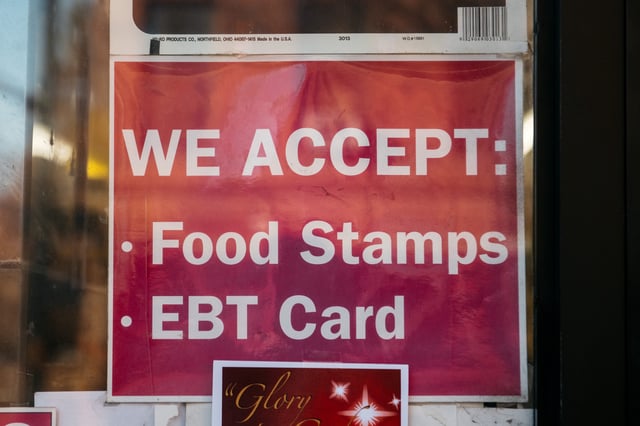 A sign alerting customers about SNAP food stamps benefits is displayed at a Brooklyn grocery store on December 5, 2019 in New York City.