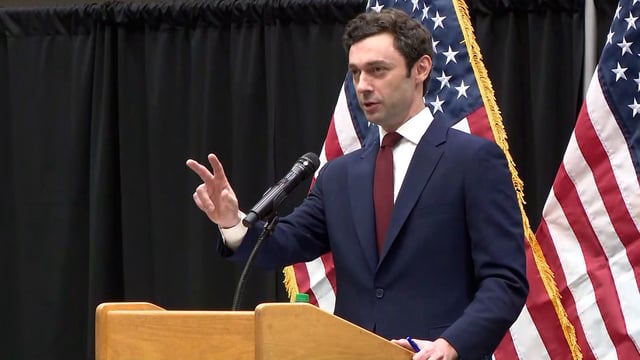 Sen. Jon Ossoff speaks during a town hall in Cobb County, Georgia on Friday.