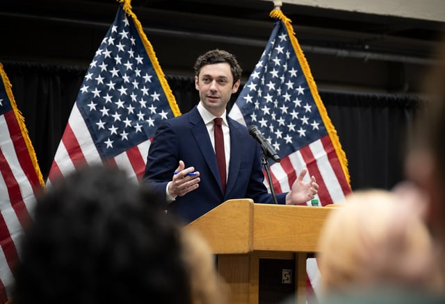 Sen. Jon Ossoff, D-Ga., takes questions from the angry audience at a  town hall meeting at the Cobb Civic Center, in Marietta, Ga., on April 25, 2025.