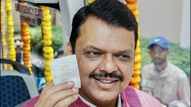 Maharashtra Chief Minister Devendra Fadnavis takes a ride in the BEST's electric AC bus service after its inauguration, in Mumbai on Friday. (CMO Maharashtra - X)