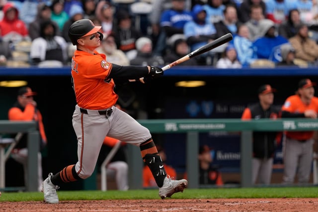 Baltimore Orioles&#39; Tyler O&#39;Neill watches hit two-run triple during the seventh inning of a baseball game against the Kansas City Royals, Saturday, April 5, 2025, in Kansas City, Mo.
