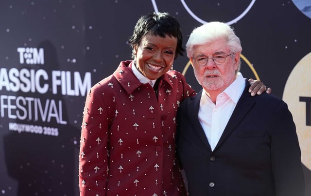 George Lucas, right, creator of the “Star Wars” film series, and his wife Mellody Hobson arrive at the 45th anniversary presentation of “Star Wars: The Empire Strikes Back” on opening night of the TCM Classic Film Festival on Thursday, April 24, at the TCL Chinese Theatre in Los Angeles. Lucas finally addressed one of the franchise’s most enduring mysteries: Why does Yoda talk the way he does?