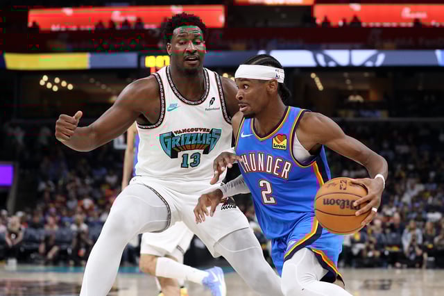Shai Gilgeous-Alexander #2 of the Oklahoma City Thunder drives to the basket during the second half against Jaren Jackson Jr. #13 of the Memphis Grizzlies during Game Three of the Western Conference First Round NBA Playoffs at FedExForum on April 24, 2025 in Memphis, Tennessee.