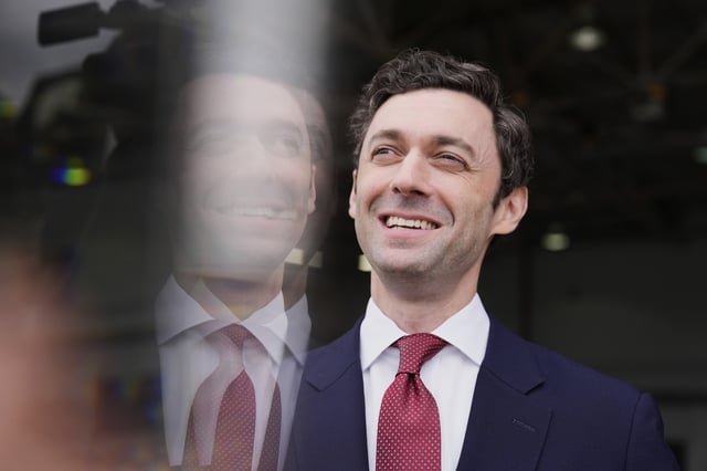 Sen. Jon Ossoff, D-Ga., speaks during an interview at Dobbins Air Reserve Base, Saturday, April 26, 2025, in Marietta, Ga. (AP Photo/Brynn Anderson)