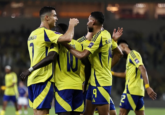 Soccer Football - Asian Champions League - Quarter Final - Yokohama F Marinos v Al Nassr - Prince Abdullah Al-Faisal Sports City Stadium, Jeddah, Saudi Arabia - April 26, 2025 Al Nassr's Jhon Duran celebrates scoring their first goal with Cristiano Ronaldo teammates REUTERS/Stringer
