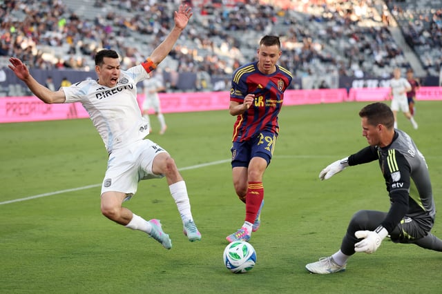SAN DIEGO, CALIFORNIA – APRIL 26: Rafael Cabral #1 and Sam Junqua #29 of Real Salt Lake defend against Chucky Lozano #11 of San Diego FC during the second half of a game at Snapdragon Stadium on April 26, 2025 in San Diego, California. (Photo by Sean M. Haffey/Getty Images)